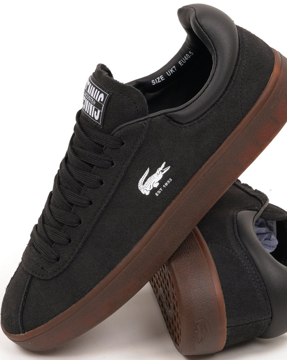 Lacoste Baseshot trainers in black and dark gum.